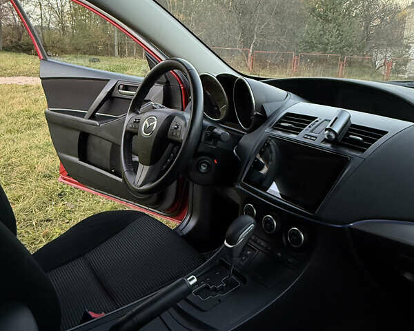 Красный Мазда 3, объемом двигателя 1.6 л и пробегом 51 тыс. км за 9800 $, фото 12 на Automoto.ua