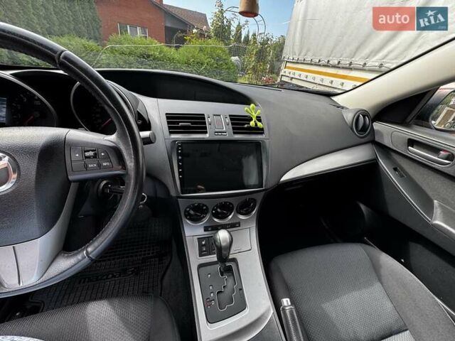 Красный Мазда 3, объемом двигателя 1.6 л и пробегом 128 тыс. км за 8500 $, фото 12 на Automoto.ua