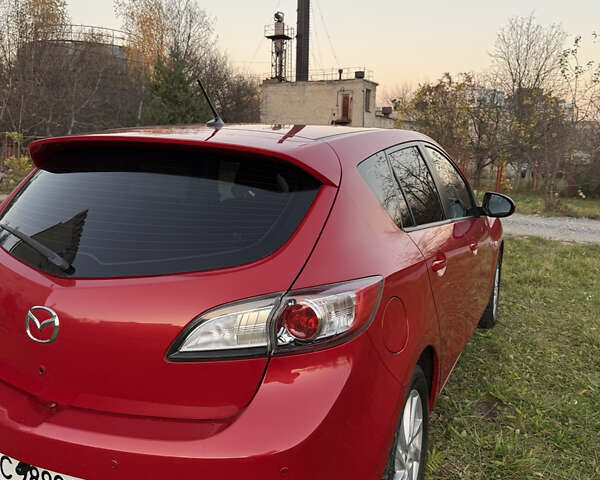 Красный Мазда 3, объемом двигателя 1.6 л и пробегом 51 тыс. км за 9800 $, фото 4 на Automoto.ua