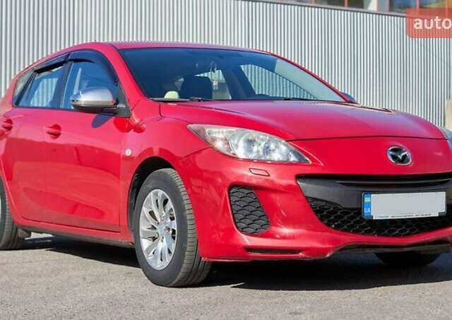 Красный Мазда 3, объемом двигателя 1.6 л и пробегом 140 тыс. км за 6900 $, фото 8 на Automoto.ua