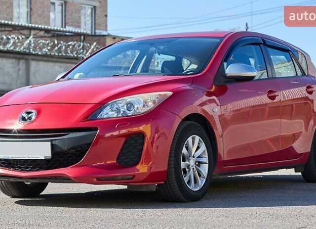 Красный Мазда 3, объемом двигателя 1.6 л и пробегом 140 тыс. км за 6900 $, фото 7 на Automoto.ua