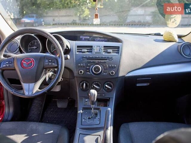Красный Мазда 3, объемом двигателя 1.6 л и пробегом 140 тыс. км за 6900 $, фото 5 на Automoto.ua