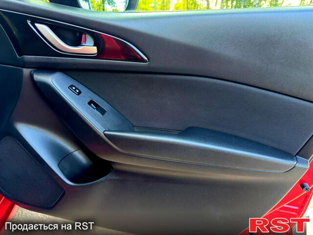 Красный Мазда 3, объемом двигателя 2 л и пробегом 143 тыс. км за 9350 $, фото 9 на Automoto.ua