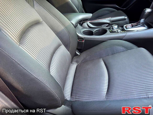 Красный Мазда 3, объемом двигателя 2 л и пробегом 143 тыс. км за 9350 $, фото 11 на Automoto.ua