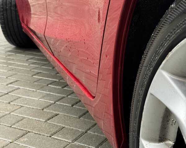 Красный Мазда 3, объемом двигателя 2.19 л и пробегом 208 тыс. км за 11850 $, фото 9 на Automoto.ua