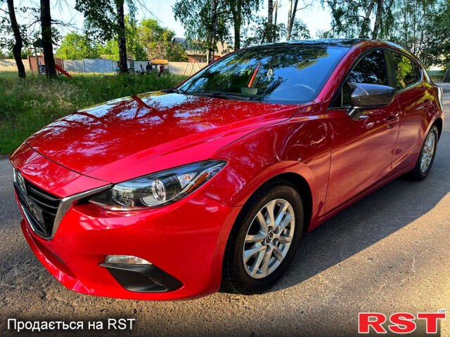 Красный Мазда 3, объемом двигателя 2 л и пробегом 143 тыс. км за 9350 $, фото 1 на Automoto.ua