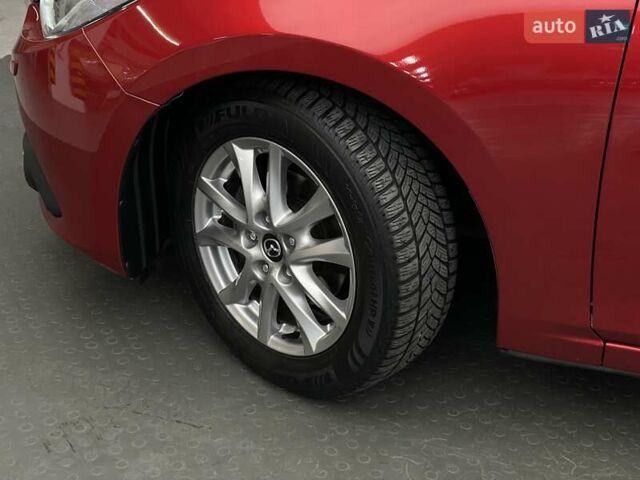 Красный Мазда 3, объемом двигателя 1.5 л и пробегом 143 тыс. км за 11986 $, фото 7 на Automoto.ua