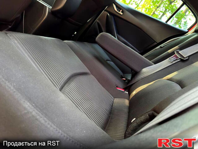 Красный Мазда 3, объемом двигателя 2 л и пробегом 143 тыс. км за 9350 $, фото 8 на Automoto.ua