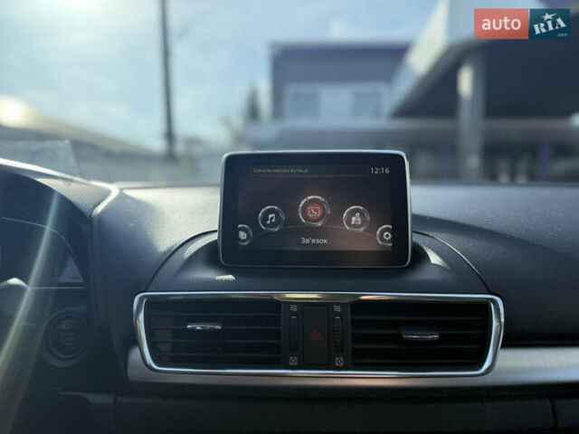 Красный Мазда 3, объемом двигателя 2.2 л и пробегом 149 тыс. км за 11200 $, фото 13 на Automoto.ua