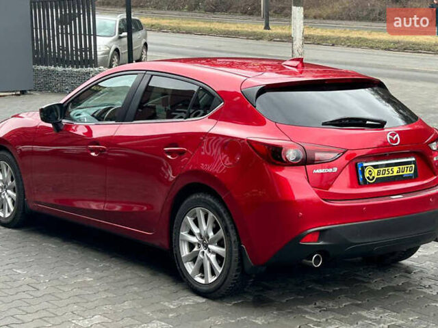 Красный Мазда 3, объемом двигателя 2.19 л и пробегом 142 тыс. км за 14000 $, фото 3 на Automoto.ua