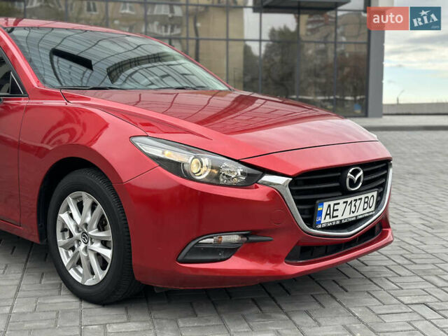 Красный Мазда 3, объемом двигателя 2 л и пробегом 56 тыс. км за 12500 $, фото 3 на Automoto.ua