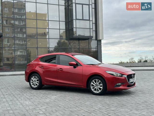 Красный Мазда 3, объемом двигателя 2 л и пробегом 56 тыс. км за 12500 $, фото 4 на Automoto.ua