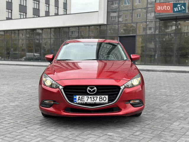 Красный Мазда 3, объемом двигателя 2 л и пробегом 56 тыс. км за 12500 $, фото 1 на Automoto.ua