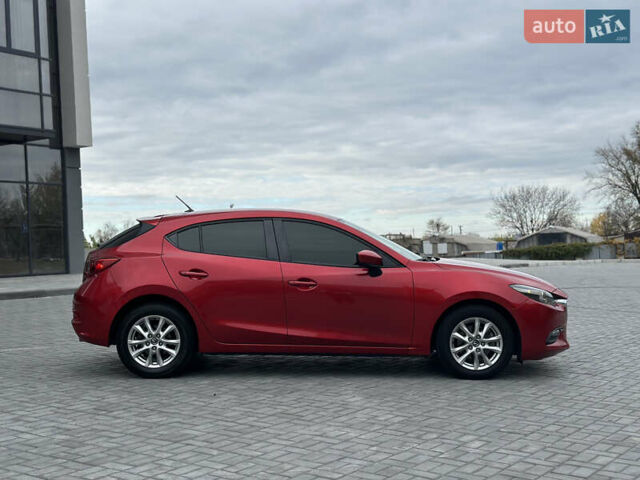 Красный Мазда 3, объемом двигателя 2 л и пробегом 56 тыс. км за 12500 $, фото 5 на Automoto.ua