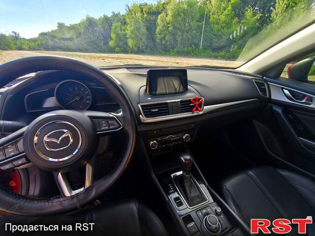 Красный Мазда 3, объемом двигателя 2 л и пробегом 56 тыс. км за 14500 $, фото 3 на Automoto.ua