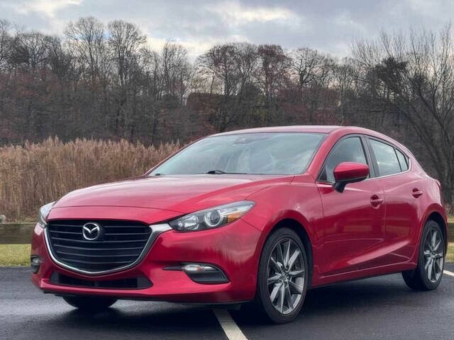 Красный Мазда 3, объемом двигателя 2.5 л и пробегом 32 тыс. км за 4100 $, фото 2 на Automoto.ua