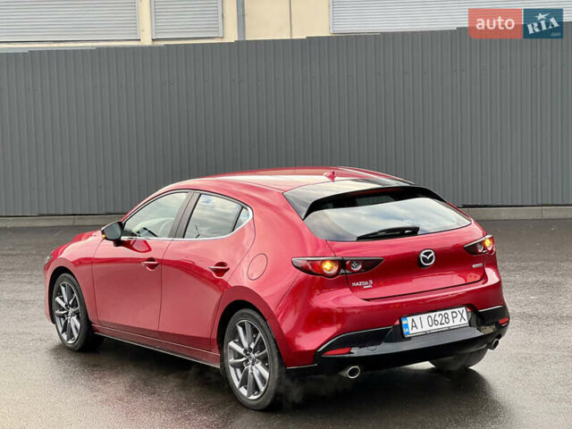Красный Мазда 3, объемом двигателя 2.49 л и пробегом 73 тыс. км за 17500 $, фото 2 на Automoto.ua
