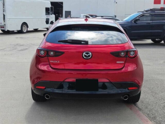 Красный Мазда 3, объемом двигателя 2.5 л и пробегом 10 тыс. км за 12000 $, фото 5 на Automoto.ua