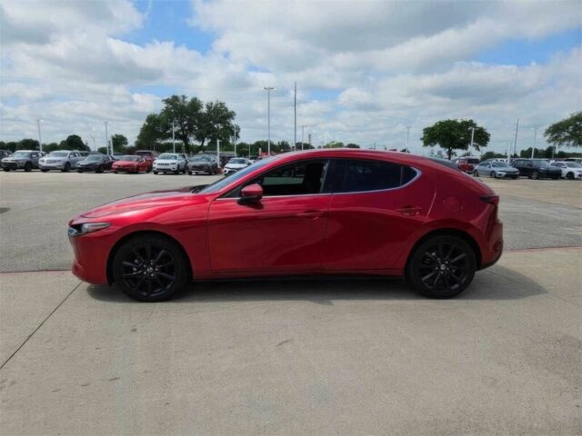 Красный Мазда 3, объемом двигателя 2.5 л и пробегом 10 тыс. км за 12000 $, фото 3 на Automoto.ua