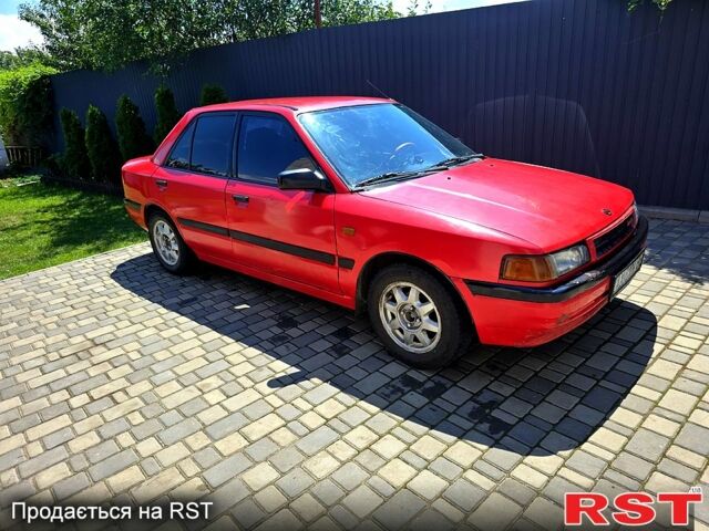 Красный Мазда 3, объемом двигателя 1.6 л и пробегом 240 тыс. км за 1450 $, фото 1 на Automoto.ua