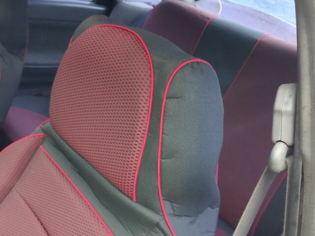 Красный Мазда 3, объемом двигателя 1.8 л и пробегом 320 тыс. км за 1700 $, фото 8 на Automoto.ua