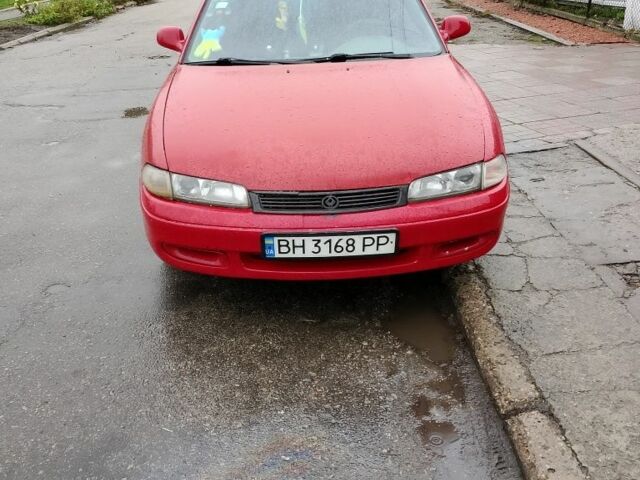 Красный Мазда 3, объемом двигателя 1.8 л и пробегом 320 тыс. км за 1700 $, фото 2 на Automoto.ua