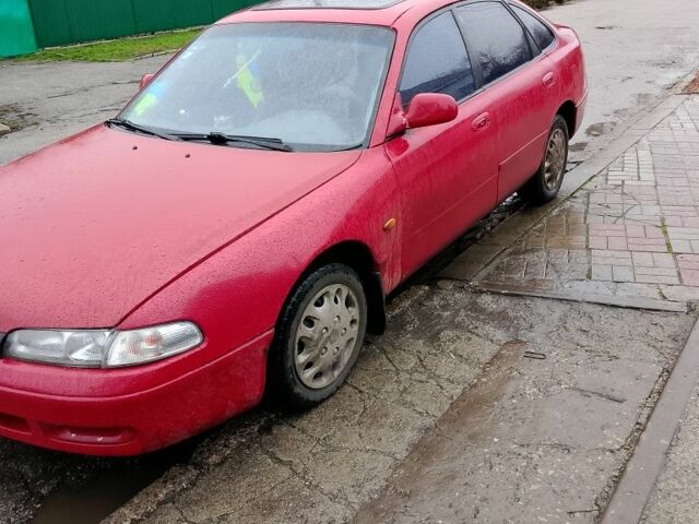 Красный Мазда 3, объемом двигателя 1.8 л и пробегом 320 тыс. км за 1700 $, фото 3 на Automoto.ua