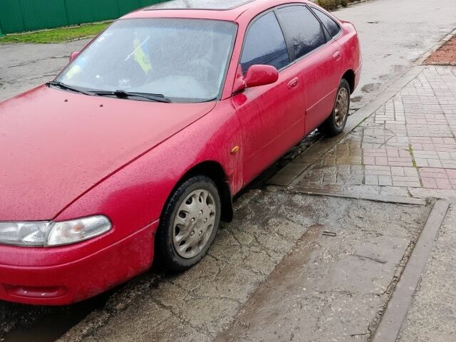 Красный Мазда 3, объемом двигателя 1.8 л и пробегом 320 тыс. км за 1700 $, фото 1 на Automoto.ua