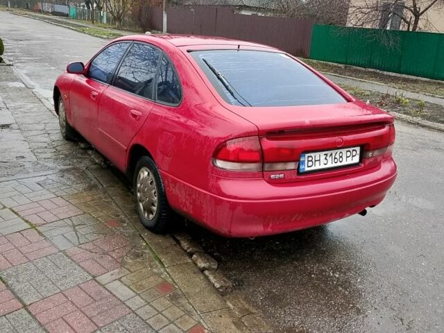 Красный Мазда 3, объемом двигателя 1.8 л и пробегом 320 тыс. км за 1700 $, фото 4 на Automoto.ua