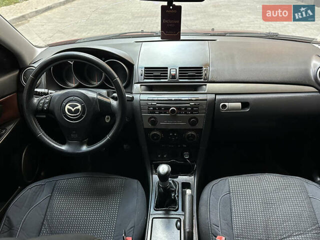 Красный Мазда 3, объемом двигателя 2 л и пробегом 250 тыс. км за 3650 $, фото 8 на Automoto.ua