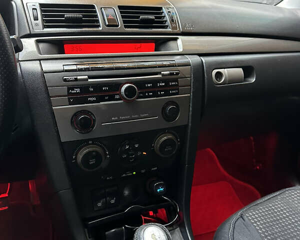 Красный Мазда 3, объемом двигателя 2 л и пробегом 250 тыс. км за 3650 $, фото 18 на Automoto.ua