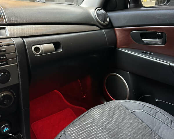 Красный Мазда 3, объемом двигателя 2 л и пробегом 250 тыс. км за 3650 $, фото 16 на Automoto.ua