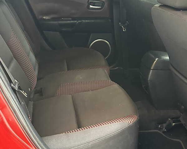 Красный Мазда 3, объемом двигателя 2 л и пробегом 250 тыс. км за 3650 $, фото 11 на Automoto.ua