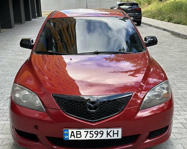 Красный Мазда 3, объемом двигателя 2 л и пробегом 250 тыс. км за 3650 $, фото 5 на Automoto.ua
