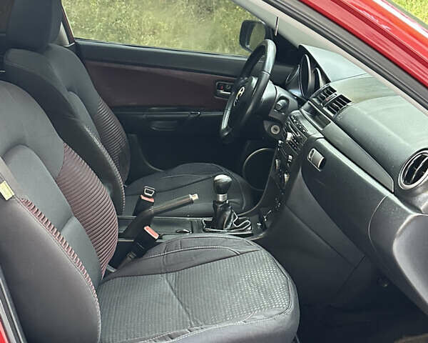 Красный Мазда 3, объемом двигателя 2 л и пробегом 250 тыс. км за 3650 $, фото 9 на Automoto.ua