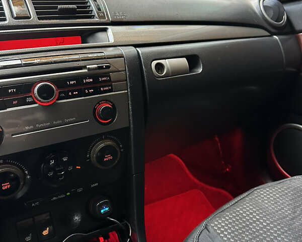 Красный Мазда 3, объемом двигателя 2 л и пробегом 250 тыс. км за 3650 $, фото 2 на Automoto.ua