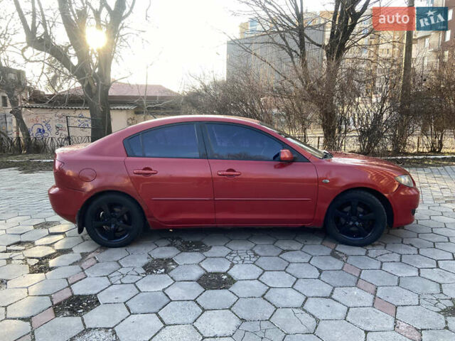 Красный Мазда 3, объемом двигателя 1.6 л и пробегом 298 тыс. км за 2600 $, фото 5 на Automoto.ua
