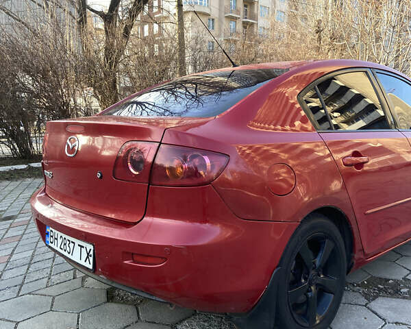 Красный Мазда 3, объемом двигателя 1.6 л и пробегом 298 тыс. км за 2600 $, фото 4 на Automoto.ua
