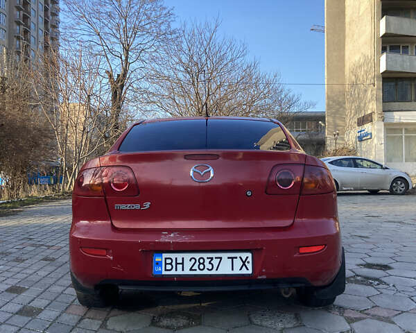 Красный Мазда 3, объемом двигателя 1.6 л и пробегом 298 тыс. км за 2600 $, фото 2 на Automoto.ua