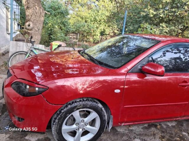 Красный Мазда 3, объемом двигателя 2 л и пробегом 210 тыс. км за 2700 $, фото 5 на Automoto.ua