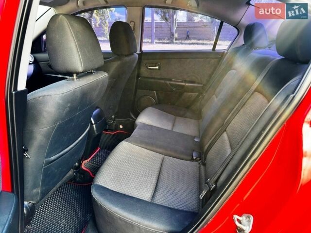 Червоний Мазда 3, об'ємом двигуна 2 л та пробігом 211 тис. км за 4500 $, фото 14 на Automoto.ua