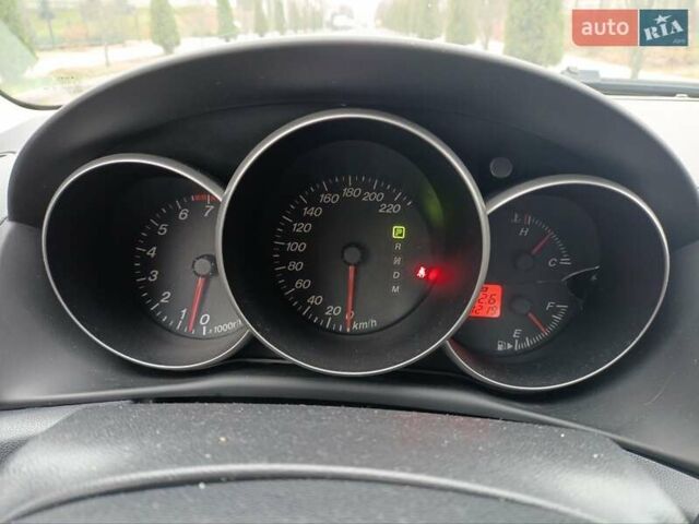 Красный Мазда 3, объемом двигателя 1.6 л и пробегом 280 тыс. км за 4299 $, фото 18 на Automoto.ua