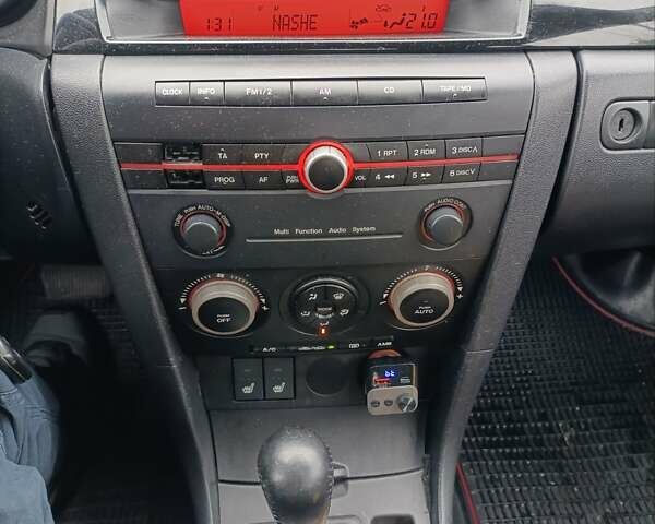 Красный Мазда 3, объемом двигателя 1.6 л и пробегом 280 тыс. км за 4299 $, фото 15 на Automoto.ua