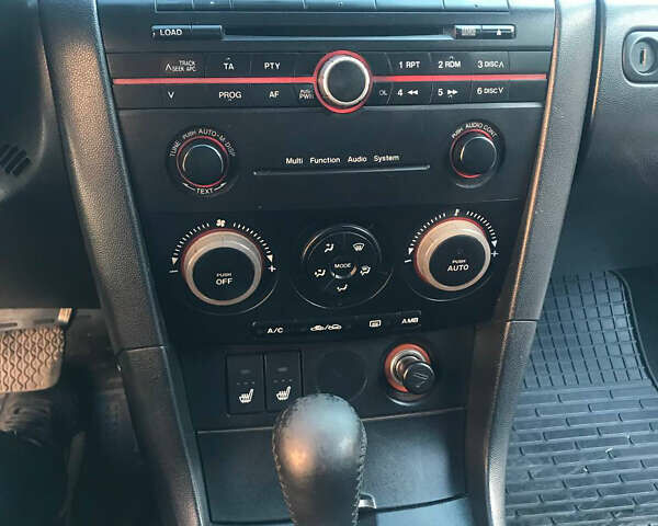 Красный Мазда 3, объемом двигателя 1.6 л и пробегом 193 тыс. км за 5000 $, фото 3 на Automoto.ua