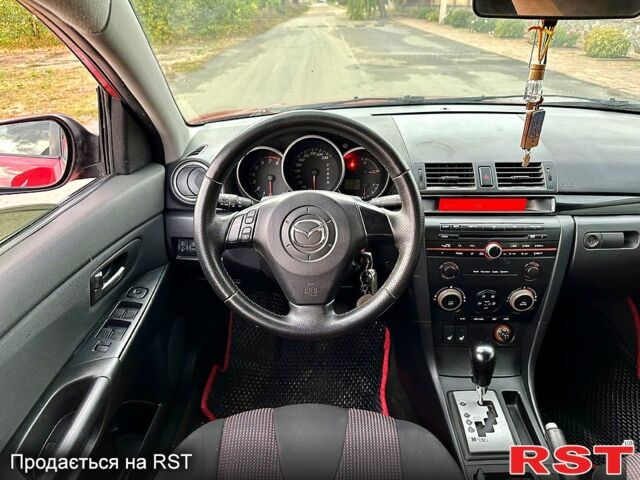 Красный Мазда 3, объемом двигателя 1.6 л и пробегом 250 тыс. км за 4750 $, фото 5 на Automoto.ua