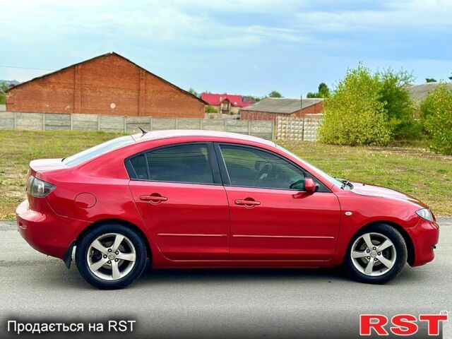 Красный Мазда 3, объемом двигателя 1.6 л и пробегом 250 тыс. км за 4750 $, фото 2 на Automoto.ua