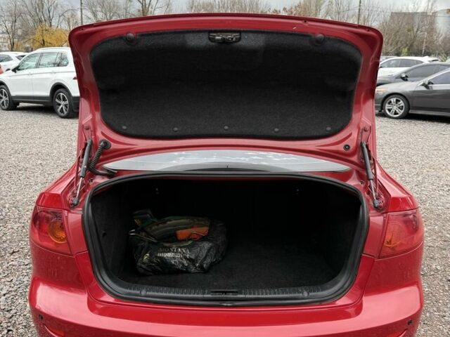 Красный Мазда 3, объемом двигателя 1.6 л и пробегом 203 тыс. км за 5300 $, фото 6 на Automoto.ua