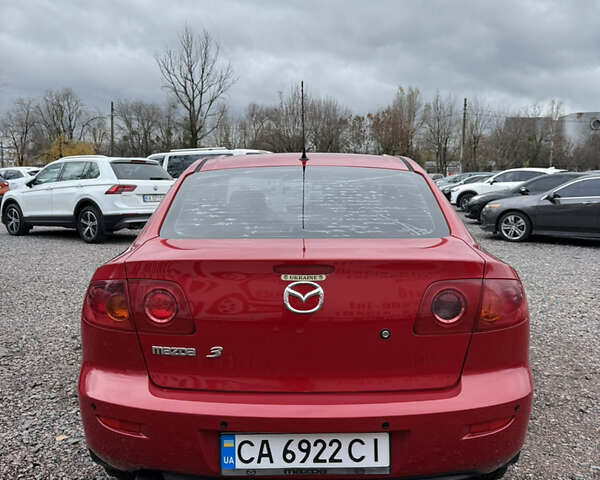 Красный Мазда 3, объемом двигателя 1.6 л и пробегом 203 тыс. км за 5300 $, фото 3 на Automoto.ua