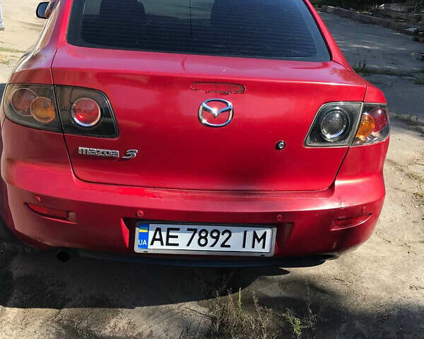 Красный Мазда 3, объемом двигателя 1.6 л и пробегом 193 тыс. км за 5000 $, фото 7 на Automoto.ua