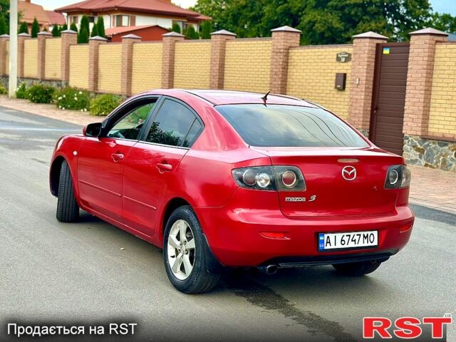 Красный Мазда 3, объемом двигателя 1.6 л и пробегом 250 тыс. км за 4750 $, фото 1 на Automoto.ua